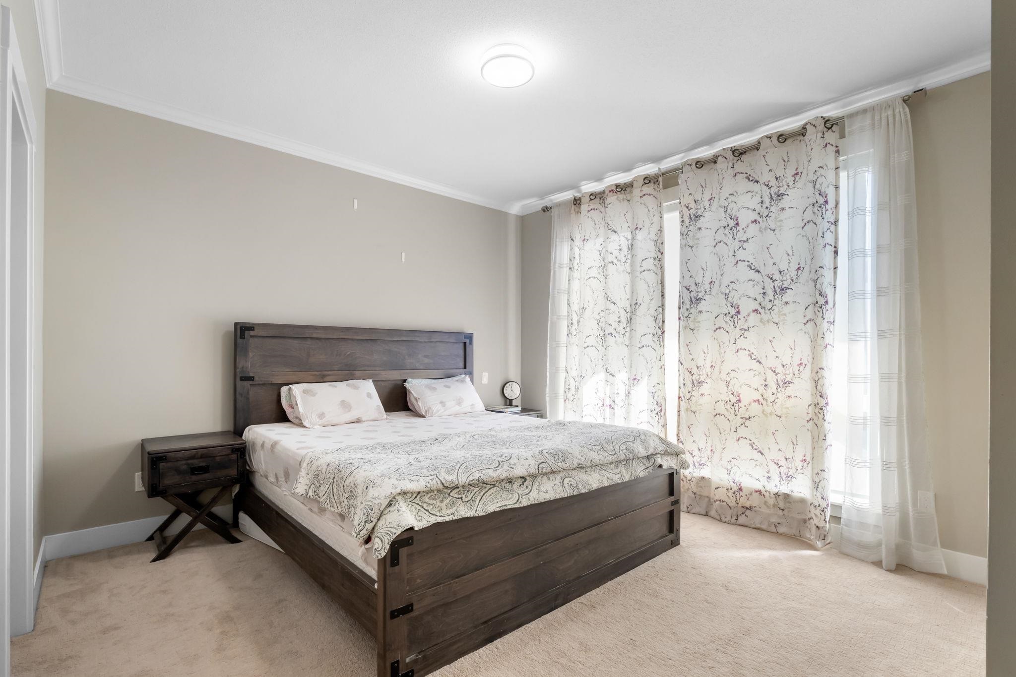 205 16488 64 AVENUE 18